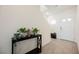 Entryway featuring light tile flooring and a console table with plants at 6148 Vista Teal Ln, Las Vegas, NV 89115