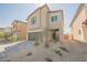 Charming two-story home featuring a two-car garage and desert landscaping at 6148 Vista Teal Ln, Las Vegas, NV 89115