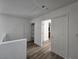 Hallway with storage and bathroom access at 6638 Babys Tear Pl, Las Vegas, NV 89148