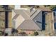 Aerial view highlighting the home's roof, drought resistant landscaping, and a backyard shed at 6781 Southgate St, Pahrump, NV 89061
