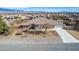 Aerial view of a beautiful home showcasing its well-kept landscape and neighborhood at 6781 Southgate St, Pahrump, NV 89061