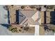 A bird's eye view of the house, highlighting the tile roof, xeriscaping, and backyard shed at 6781 Southgate St, Pahrump, NV 89061