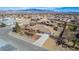 Breathtaking aerial view showcasing the home, expansive yard, and scenic mountain backdrop at 6781 Southgate St, Pahrump, NV 89061