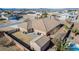 Aerial view of house with large fenced yard and shed, showcasing neighborhood setting at 6781 Southgate St, Pahrump, NV 89061