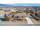Picturesque aerial view of the home featuring a large lot and neighborhood at 6781 Southgate St, Pahrump, NV 89061