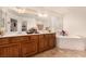 Bright bathroom featuring double vanity with tub and tile flooring at 6781 Southgate St, Pahrump, NV 89061