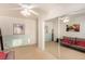 Bedroom features a ceiling fan and sliding door closet at 6781 Southgate St, Pahrump, NV 89061