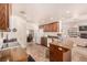 Well-lit kitchen with tile flooring and seamless flow to living areas at 6781 Southgate St, Pahrump, NV 89061