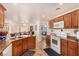 Functional kitchen with stainless appliances and breakfast bar area at 6781 Southgate St, Pahrump, NV 89061