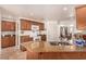 A spacious kitchen with wood cabinetry, an island, and lots of countertop space at 6781 Southgate St, Pahrump, NV 89061