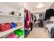 Spacious walk-in closet featuring ample shelving and clothing racks at 6781 Southgate St, Pahrump, NV 89061