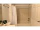 Bathroom featuring tile surround bathtub, shower, vanity with mirror, toilet, and plant at 7163 S Durango Dr # 113, Las Vegas, NV 89113