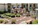 Community landscape featuring rock structures, desert plants and flowers at 7163 S Durango Dr # 113, Las Vegas, NV 89113