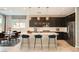 Modern kitchen with stainless steel appliances, a large island, and stylish pendant lighting at 8048 Skye Bridge St, Las Vegas, NV 89166