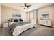 Serene main bedroom with a plush bed, neutral tones, and elegant decor at 8048 Skye Bridge St, Las Vegas, NV 89166