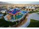Aerial view of community playground and recreation area with vibrant colors at 8048 Skye Bridge St, Las Vegas, NV 89166