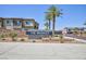 A community sign with the name The McAuley set amongst desert landscaping at 835 Aurelie Ridge St, Henderson, NV 89011