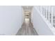Foyer with neutral paint and wood-look floors leading to the living area at 835 Aurelie Ridge St, Henderson, NV 89011