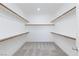 Spacious walk-in closet with multiple rods and shelves for ample storage at 835 Aurelie Ridge St, Henderson, NV 89011