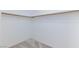 Empty walk-in closet with wooden rod and shelf storage system at 835 Aurelie Ridge St, Henderson, NV 89011