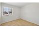 Bedroom with tile floors and a window providing natural light at 882 Westminster Ave, Las Vegas, NV 89119