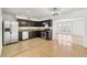 Features of the kitchen include stainless steel appliances and granite countertops with tile flooring at 882 Westminster Ave, Las Vegas, NV 89119