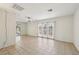 The living room features a bright and airy space with tile flooring and a ceiling fan at 882 Westminster Ave, Las Vegas, NV 89119