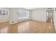 Living room featuring sleek hardwood floors and an open layout with natural light at 882 Westminster Ave, Las Vegas, NV 89119