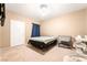 Cozy bedroom with neutral walls and carpet, with furniture for an infant at 9330 W Maule Ave # 138, Las Vegas, NV 89148