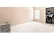 An empty bedroom features neutral walls, a built-in closet, and plush carpeting at 9330 W Maule Ave # 138, Las Vegas, NV 89148