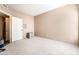 A clean, bright bedroom, ready for your personal touch, features carpet and closet at 9330 W Maule Ave # 138, Las Vegas, NV 89148