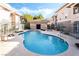 Inviting outdoor pool area, featuring sun loungers, and a clear pool, perfect for relaxation at 9330 W Maule Ave # 138, Las Vegas, NV 89148