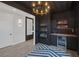 Stylish bar area with decorative ceiling, shelving and mini-fridge, ideal for entertaining at 9617 Sard Ln, Las Vegas, NV 89143