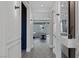 Bright hallway leading to living room with recessed lighting and stylish decorations at 9617 Sard Ln, Las Vegas, NV 89143