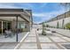Well-designed backyard featuring a paver patio, desert landscaping, and an inviting outdoor lounge area at 9789 Twilight Moon Ave, Las Vegas, NV 89148