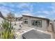 Contemporary backyard with a spa, desert landscaping, and a sleek patio design at 9789 Twilight Moon Ave, Las Vegas, NV 89148