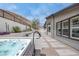 Relaxing backyard with a modern spa, desert landscaping, and stylish patio at 9789 Twilight Moon Ave, Las Vegas, NV 89148