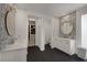 Elegant bathroom featuring dual sinks and walk-in closet at 9789 Twilight Moon Ave, Las Vegas, NV 89148