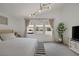 Light filled primary bedroom with access to a private patio with jacuzzi at 9789 Twilight Moon Ave, Las Vegas, NV 89148