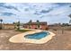An inviting backyard featuring a private pool and a well-maintained lawn for outdoor enjoyment at 1004 Woodside Ct, Henderson, NV 89015
