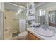 Bathroom with shower, toilet, and sink with neutral color scheme at 1004 Woodside Ct, Henderson, NV 89015
