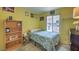 Bedroom with furniture, view of window, and neutral color scheme at 1004 Woodside Ct, Henderson, NV 89015