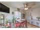 Dining area with view of window, ceiling fan, and cabinet at 1004 Woodside Ct, Henderson, NV 89015