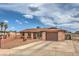 Charming single-story home boasting a well-maintained yard and attached two-car garage at 1004 Woodside Ct, Henderson, NV 89015