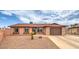 Charming single-story home with a well-maintained yard and inviting curb appeal at 1004 Woodside Ct, Henderson, NV 89015