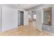 Bedroom features a large closet and mirror with an open doorway to a furnished room at 1012 Greystone Dr, Las Vegas, NV 89108