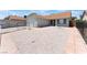 Welcoming single-story home offers a two-car garage and xeriscaped yard, providing a low-upkeep appeal at 1012 Greystone Dr, Las Vegas, NV 89108