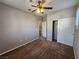 The bedroom offers carpeted floors, a closet, and a neutral color palette, ideal for personalization at 10231 Deerfield Beach Ave # 104, Las Vegas, NV 89129