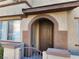 Multi-Gathering home featuring a covered entryway and gate at 10231 Deerfield Beach Ave # 104, Las Vegas, NV 89129