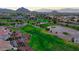 This aerial view shows the well-manicured golf course and community around it at 10305 Snyder Ave, Las Vegas, NV 89134
